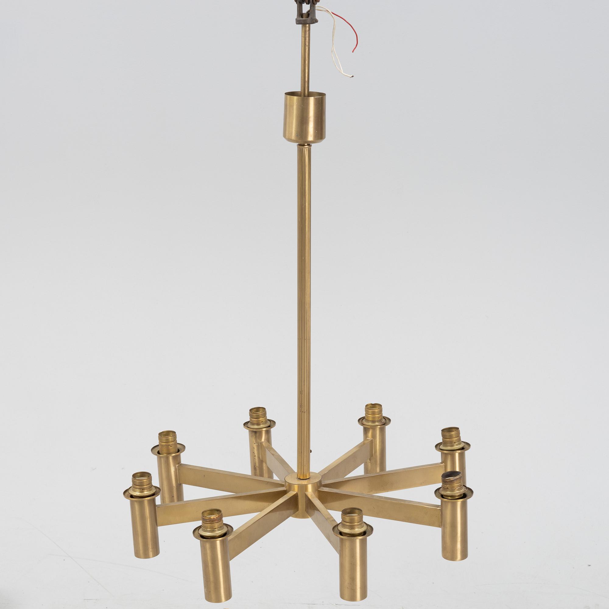 Hans-Agne Jakobsson, an eight-light brass ceiling light from Markaryd, Sweden.