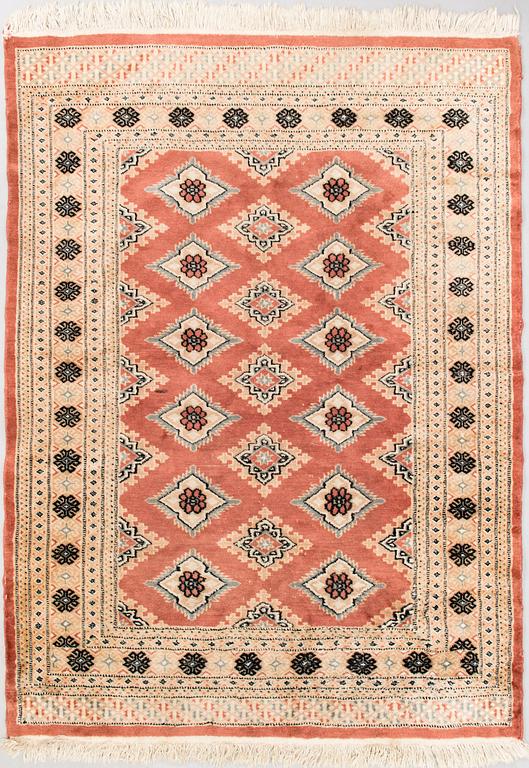 A rug from Karachi. Ca. 176x128 cm.