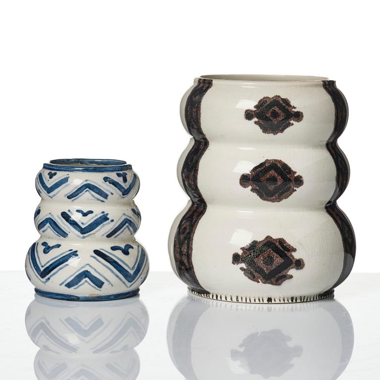 Wilhelm Kåge, a jar with cover, and four vases, creamware and porcelain, Gustavsberg, Sweden, 1917-1920.