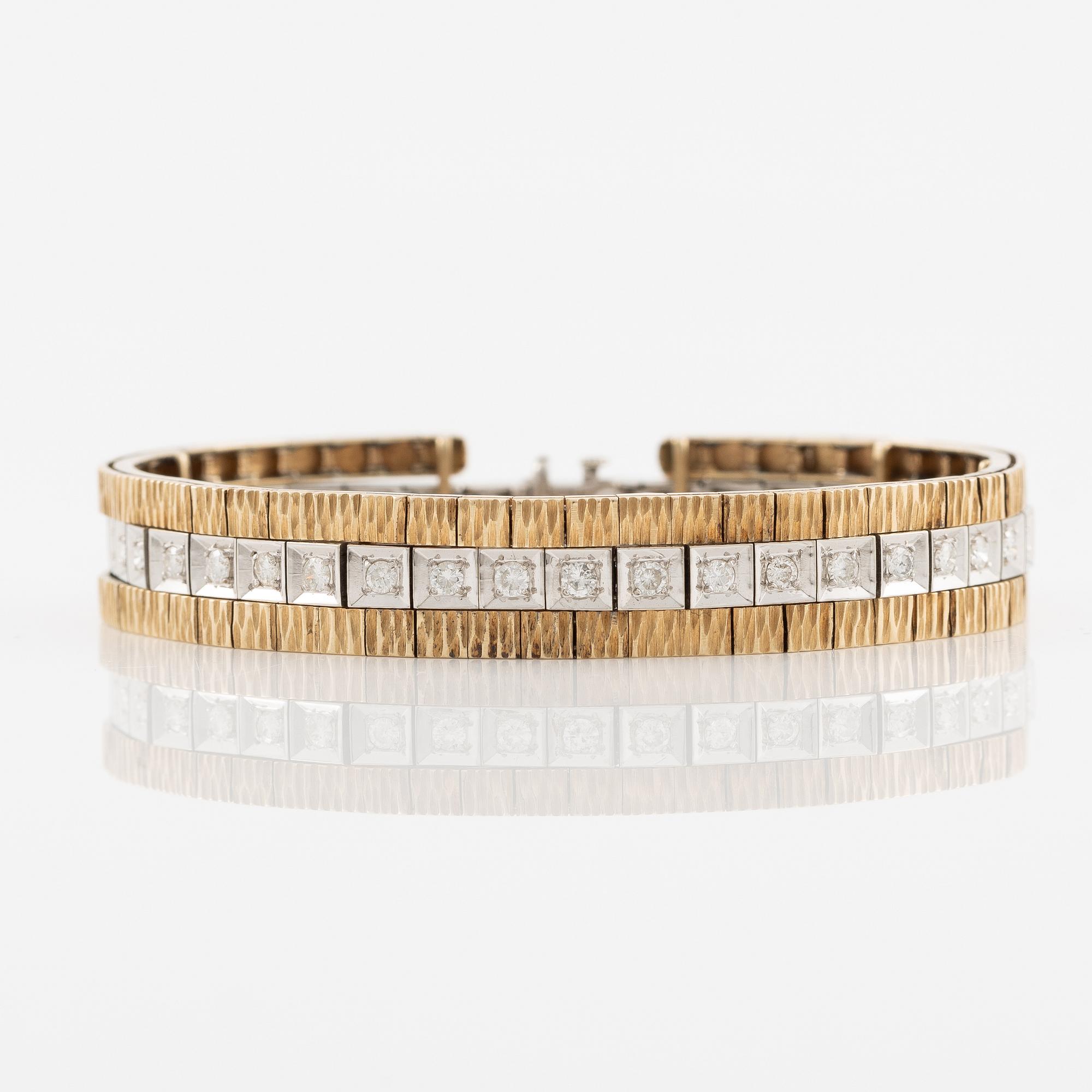 Bracelet in 14K gold and white gold with brilliant-cut diamonds.