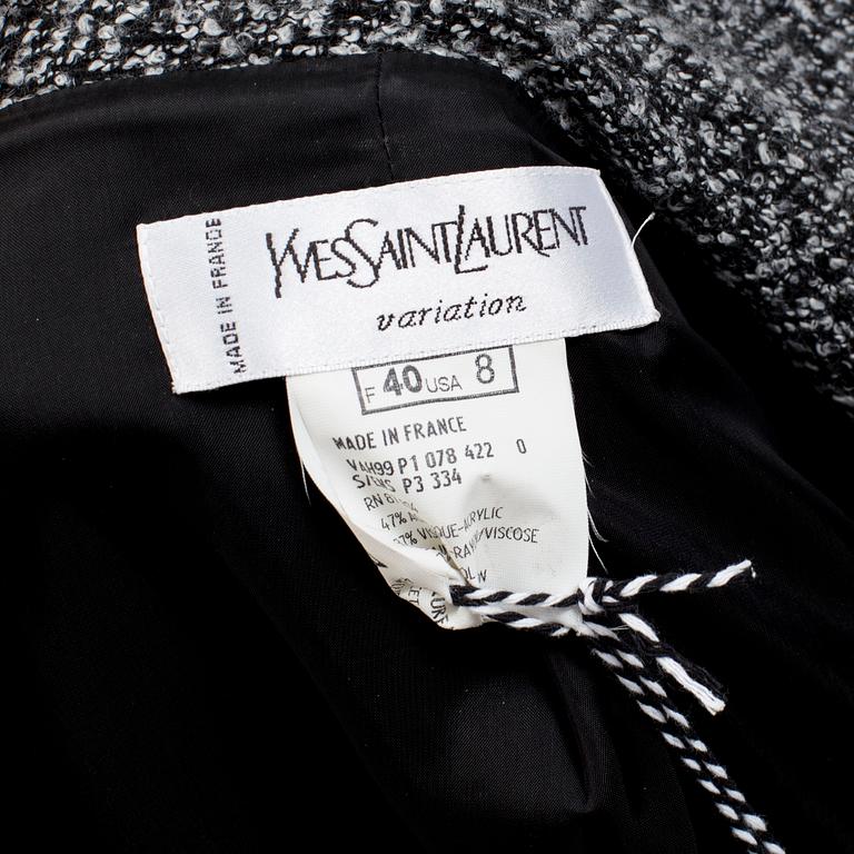 A womens two piece suit by Yves Saint Laurent.