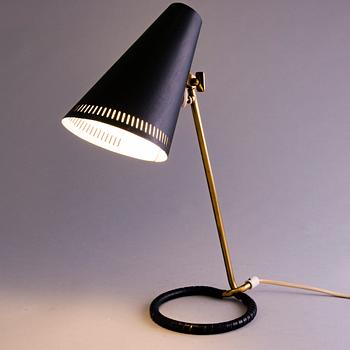 A mid-20th-century table lamp, model  K11-15 for Idman, Finland.