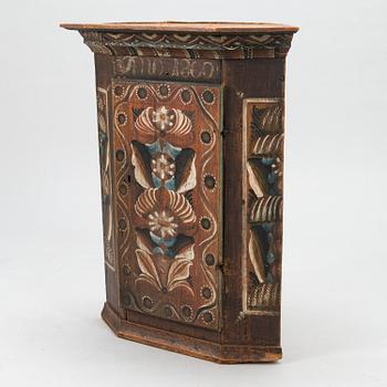 A Swedish corner cabinet from Dalarna, dated "Anno 1800".