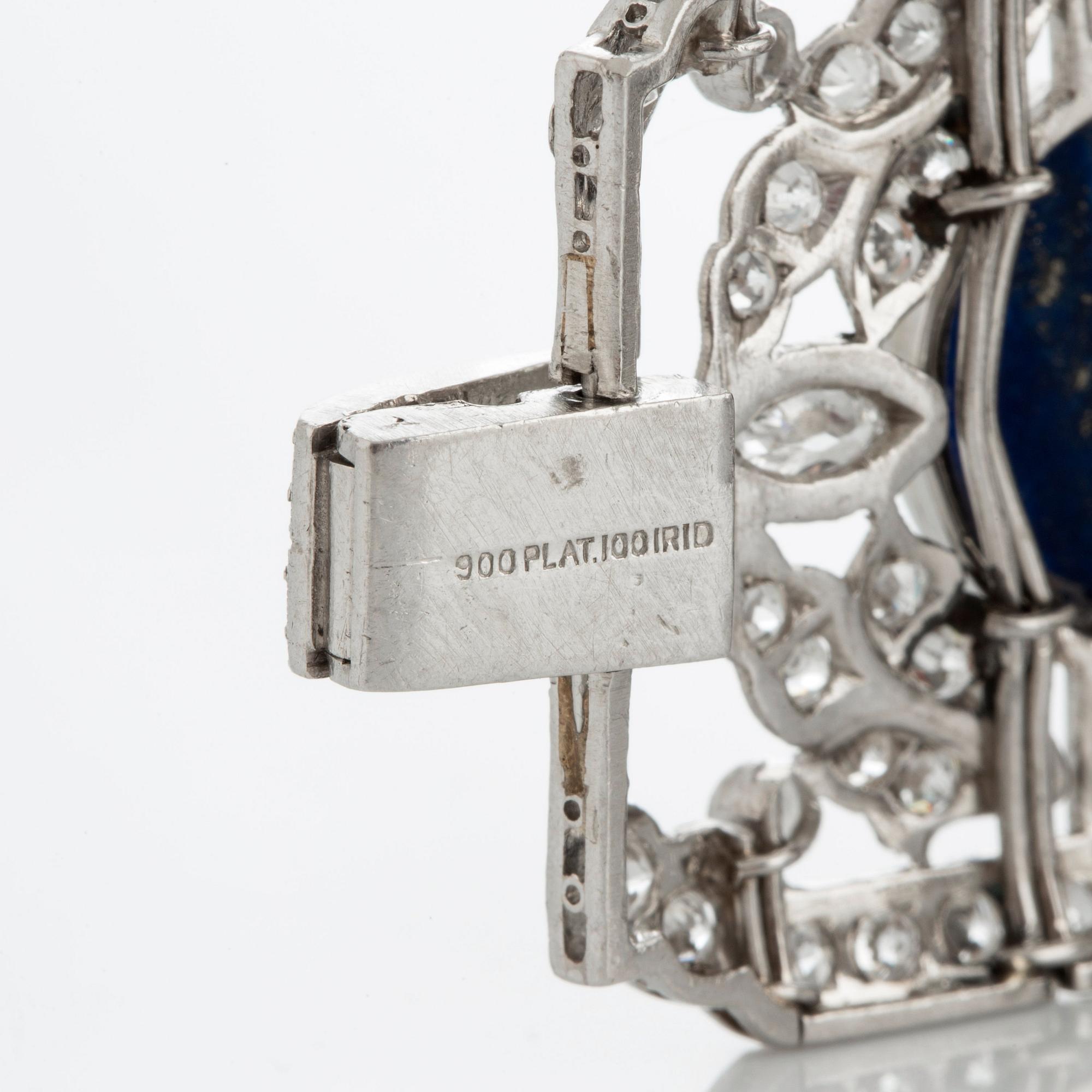 A platinum bracelet set with lapis lazuli, old-cut diamonds with a total weight of ca 10 cts and synthetic sapphires.