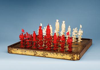 An large lacquered Games Box with ivory and bone Chess Pieces, Qing dynasty.