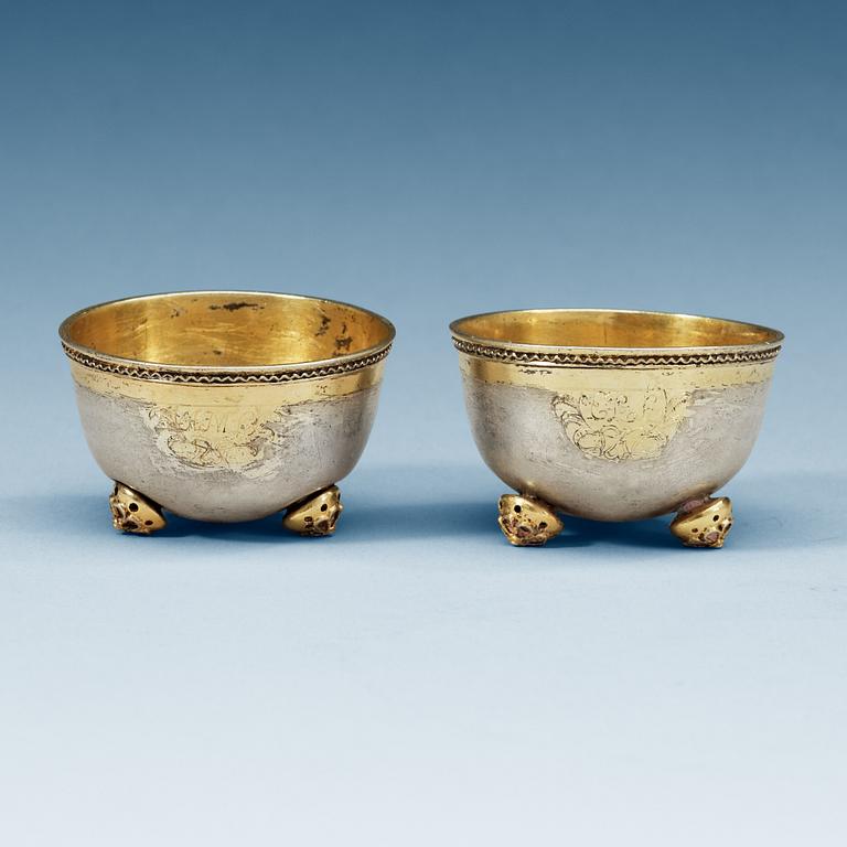 A pair of Swedish 18th century parcel-gilt cups, makers mark of Petter Zettersteen, (Norrköping 1712-1741 (-1744)).