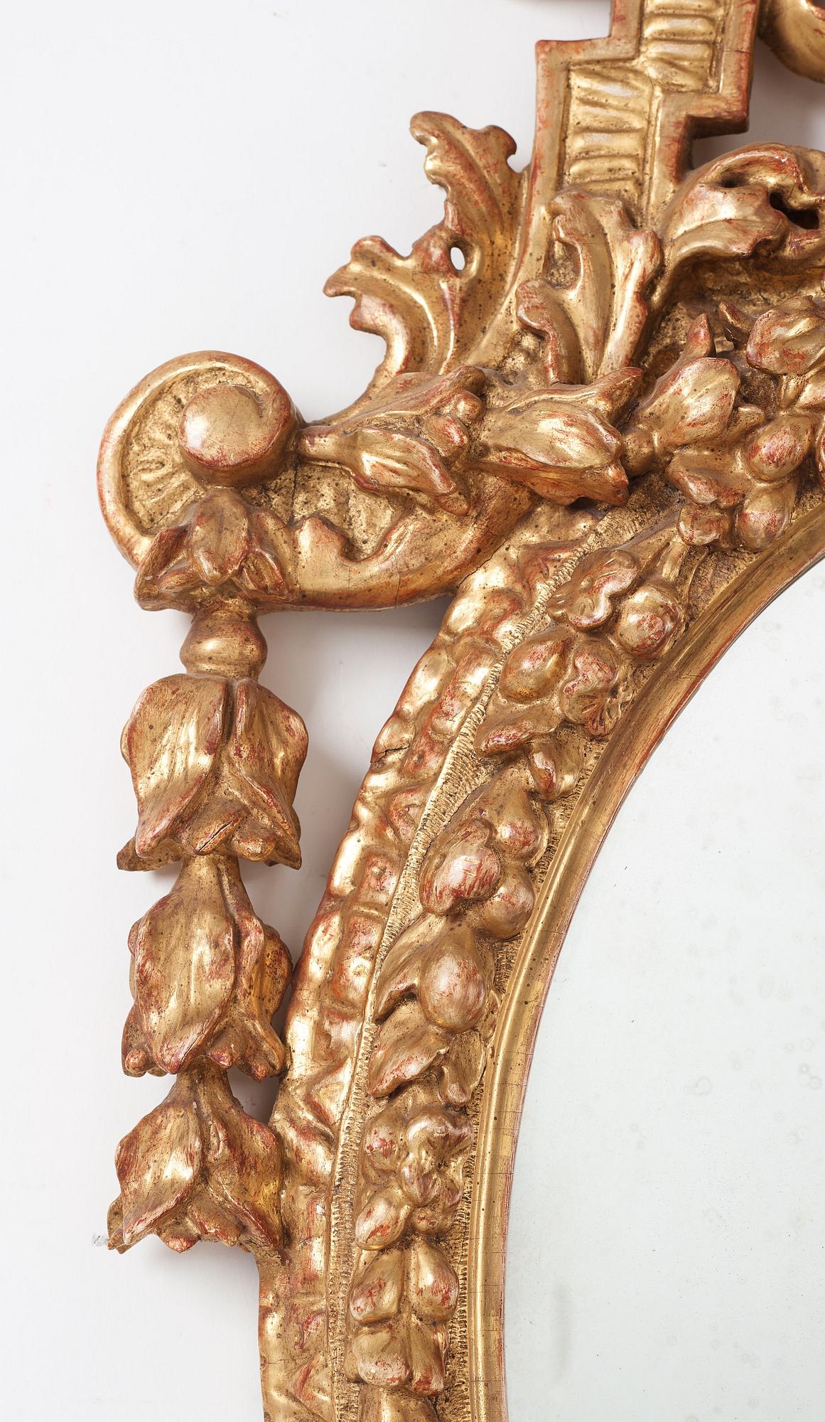 A Royal mirror by B. Precht 1706, made for the common state room of the duchesses  Ulrika Eleonora and Hedvig Sofia.