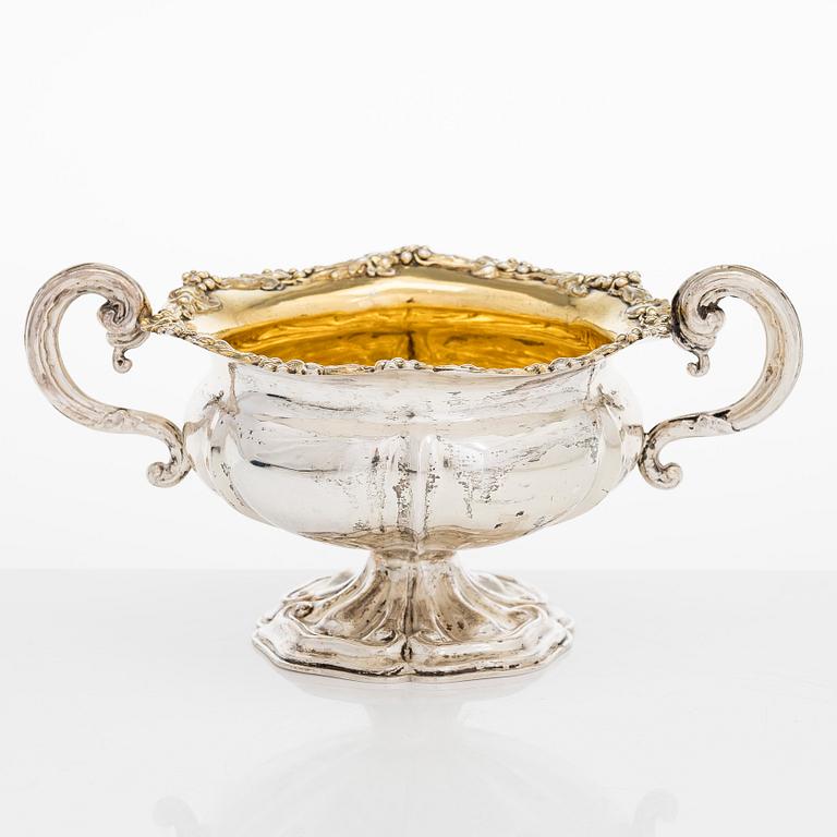 A silver sugar bowl, R. Mellin, Helsinki 1860, and two tea strainers, Kuopio and Porvoo, first half of the 19th century.