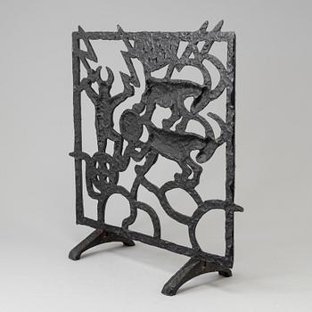 A cast iron fire shield by Olle Hermansson, Husqvarna.