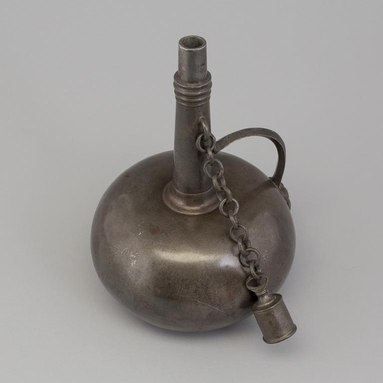 A PEWTER WINE JUG, first half of the 19th century.