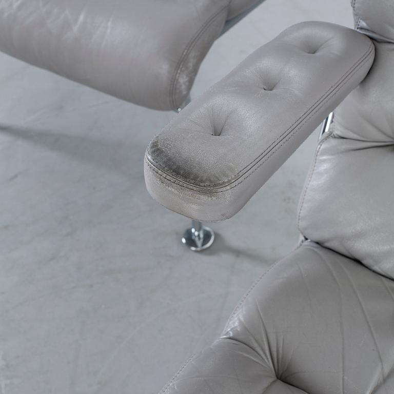 A COUPLE OF BRUNO MATHSSON ARMCHAIRS.