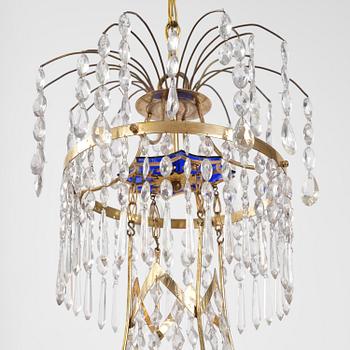 A late-Gustavian five-light gilt brass and cut glass chandelier, Stockholm, late 18th century.