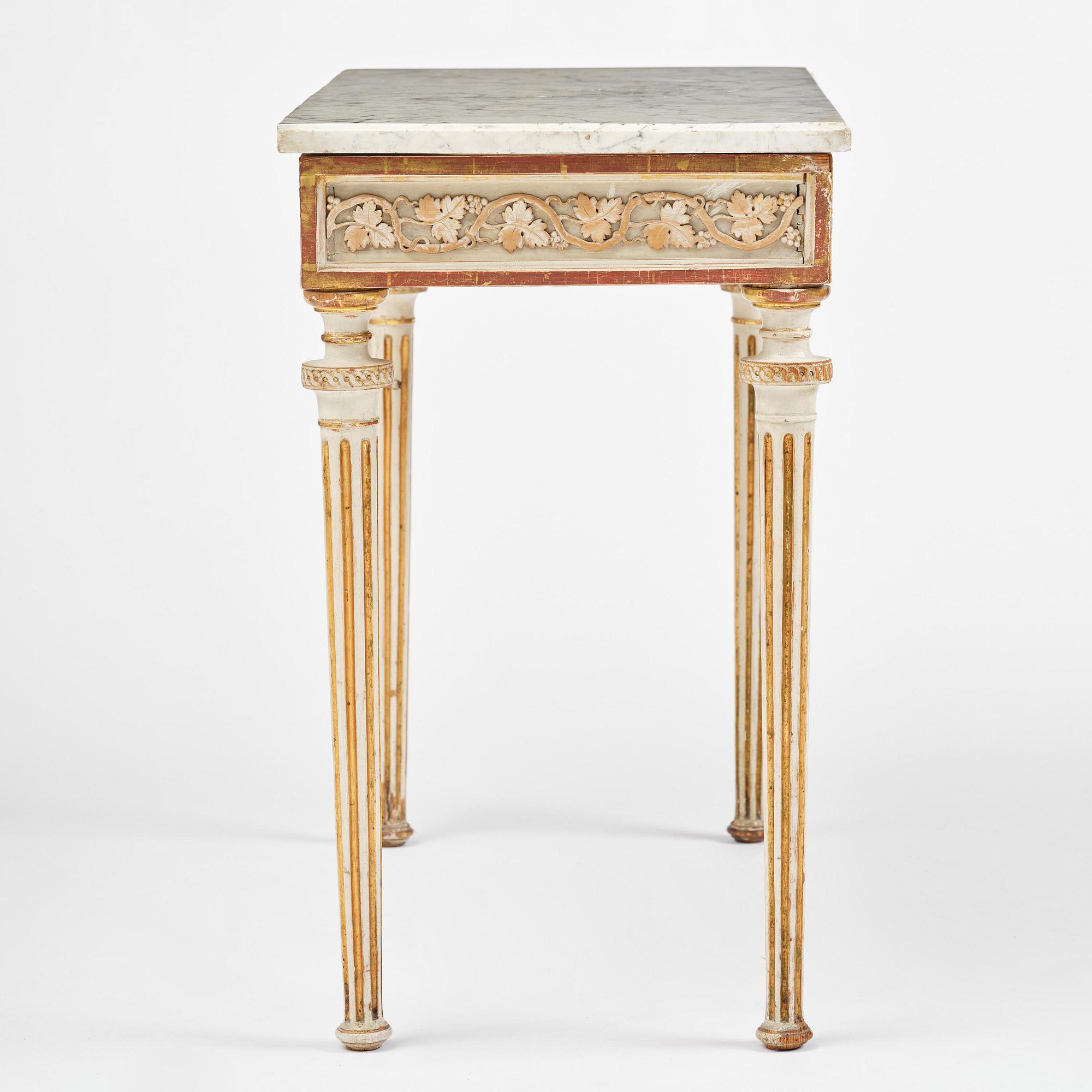 A late Gustavian carved giltwood and marble console table, attributed to P- Ljung (royal ornament carver 1788-1819).