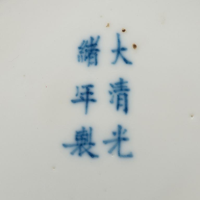 A blue and white dish, Qing dynasty, with Guangxus six character mark and of the period (1875-1908).