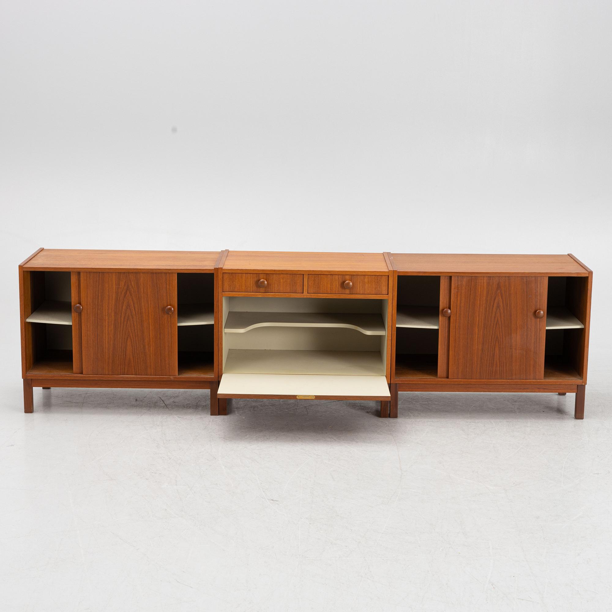Three teak-veneered cabinets, 1960's.