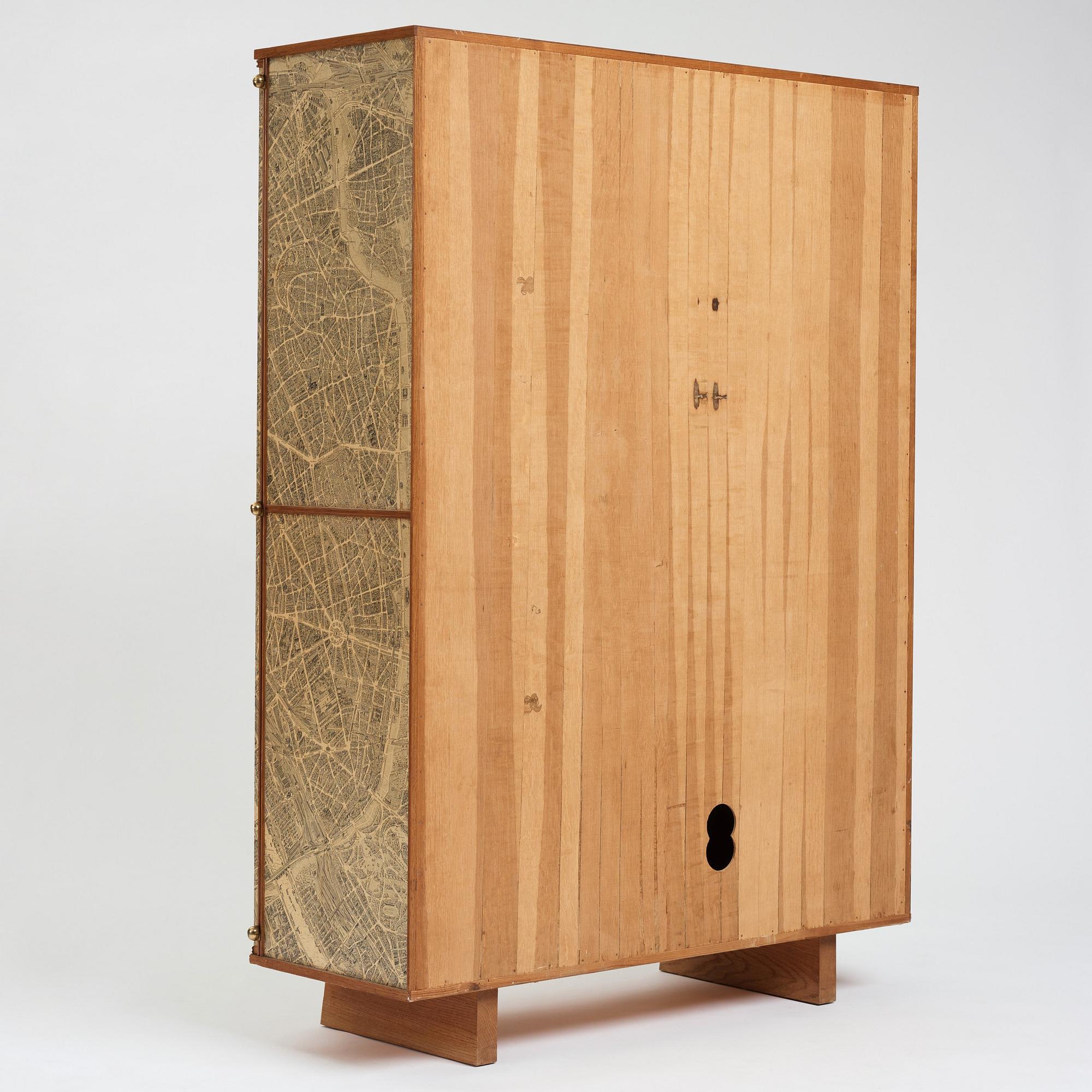 Josef Frank, a cabinet covered with Georges Peltier's 'Plan de Paris à vol d'oiseau', Svenskt Tenn, Stockholm, probably ca 1937-43.