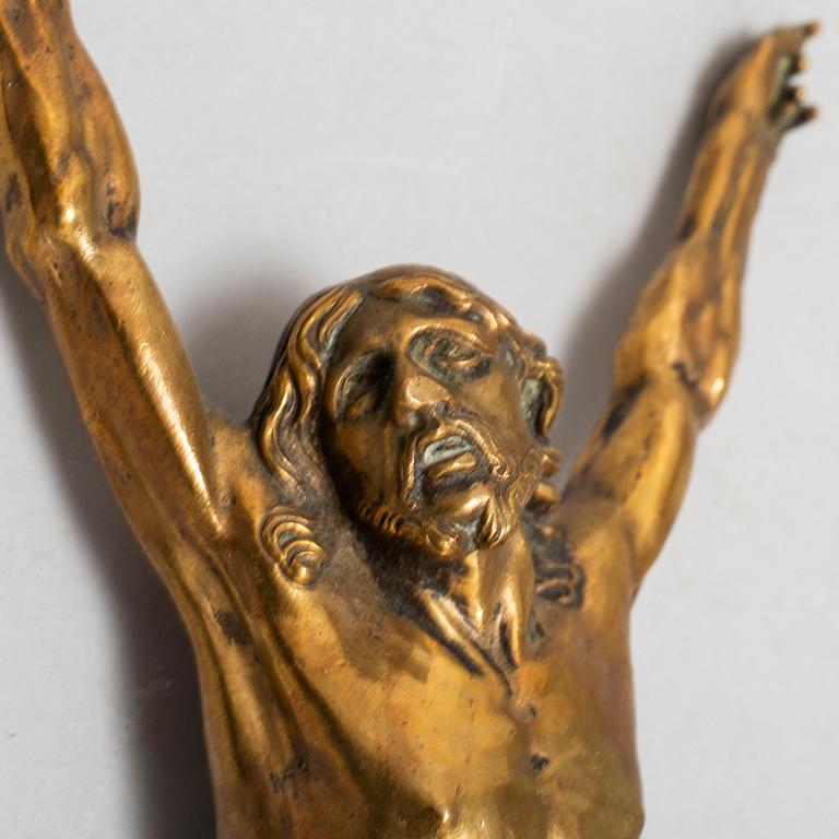 An 18th century bronze figure of Christ.