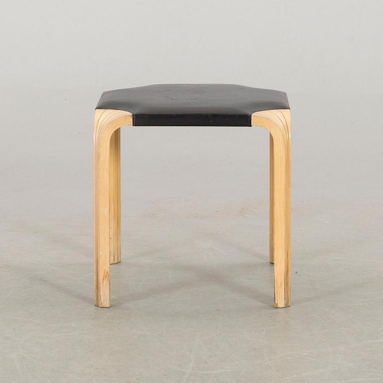AN ALVAR AALTO "X602" STOOL by Artek.