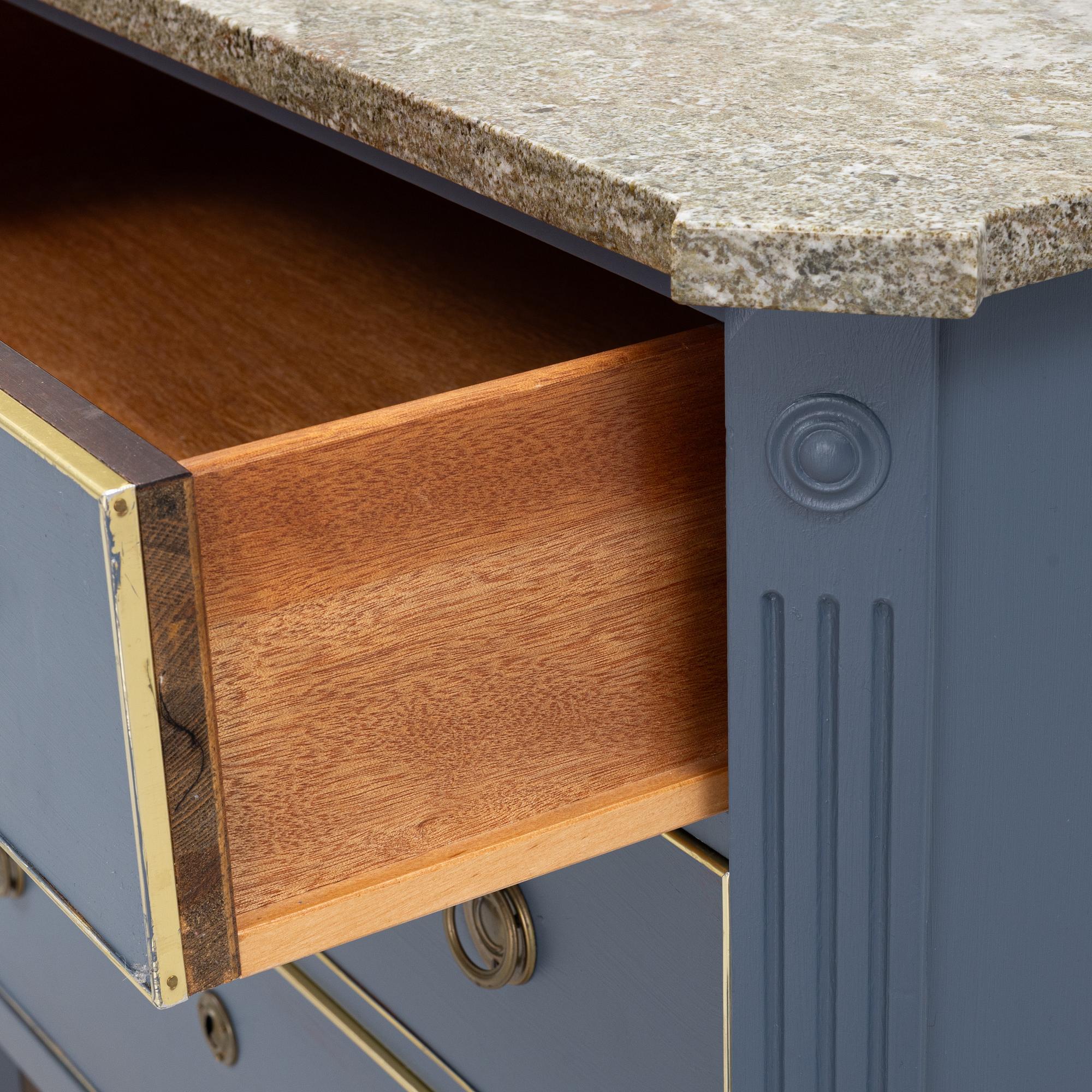 A Gustavian style chest of drawers, mid 20th Century.