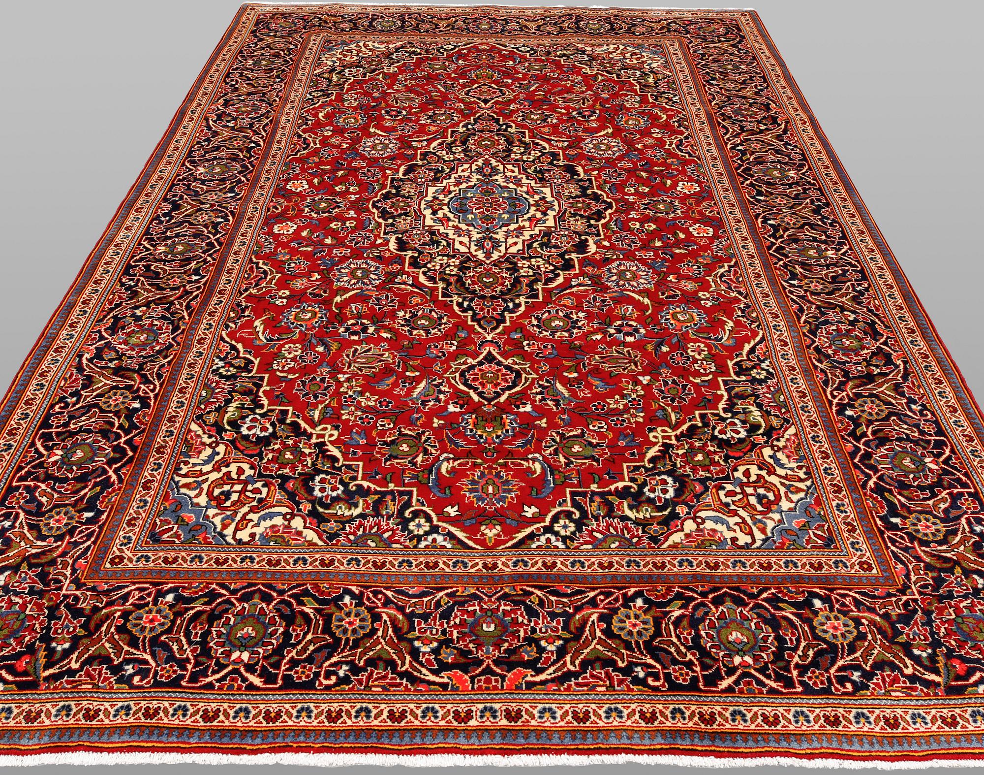 A Keshan carpet, 304 x 203 cm.