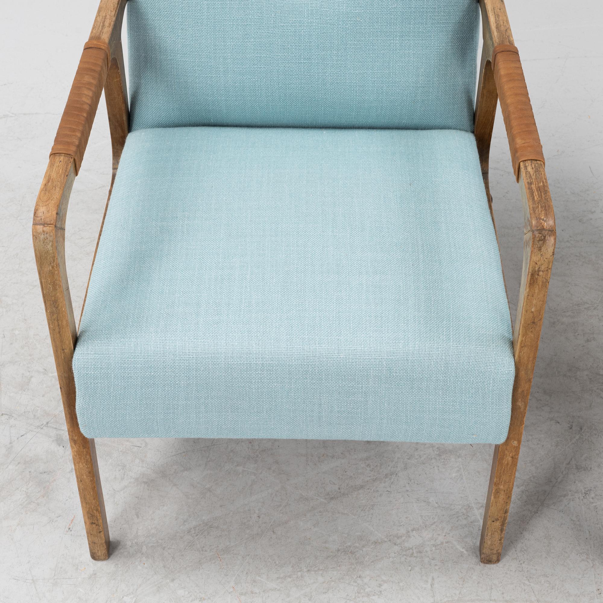 a pair of 1950's armchairs.