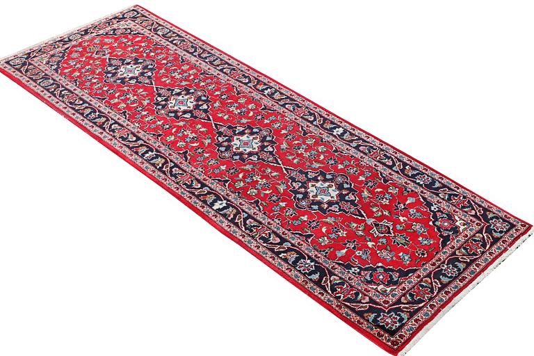 A runner carpet, Kashan, c. 307 x 100 cm.