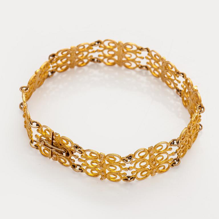 Esko Raitanen, collier, armband och örhängen, 14K guld, Helsingfors 1972.