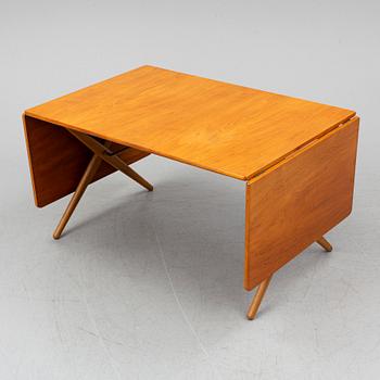 HANS J WEGNER, a teak and oak drop-leaf dining table, Andreas Tuck, Denmark 1950'-60's.