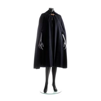 659. CÉLINE, a dark blue wool blend cape.