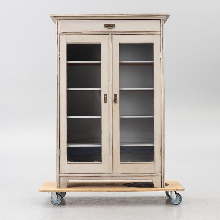 Display cabinet, early 20th century.