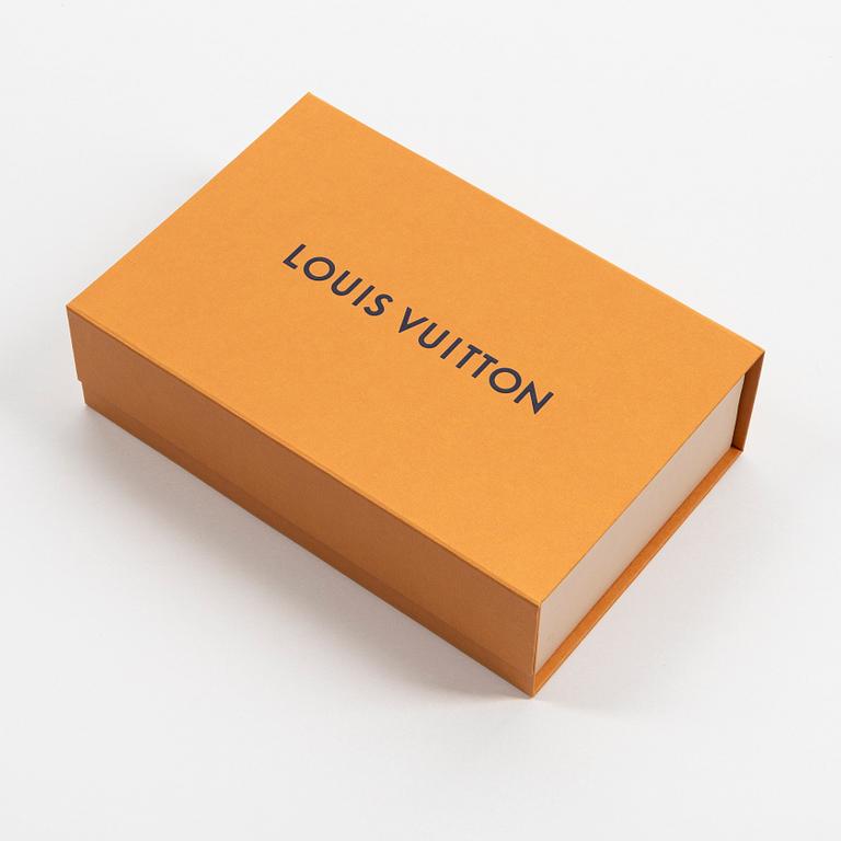 Louis Vuitton, a monogram silk and wool mix shawl.