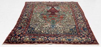 A figural oriental rug, c.. 230 x 130 cm.