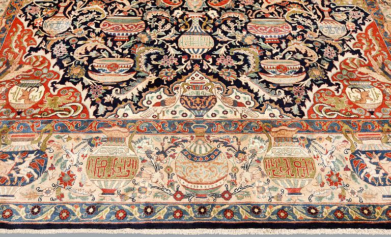A Kashmar carpet, ca 397 x 297 cm.