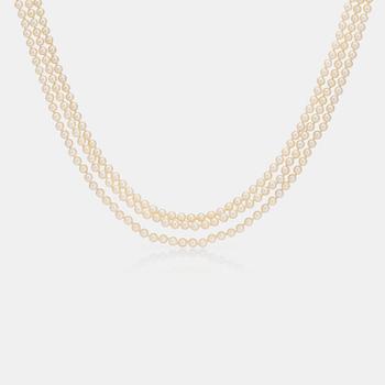 1263. A 3-strand cultured saltwater pearl necklace.