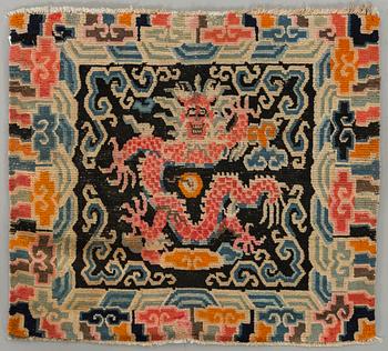 A semiantique Tibetan carpet ca 71 x 79 cm.