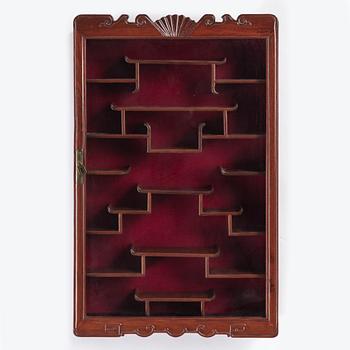 A Chinese 20th century hardwood wall cabinet.