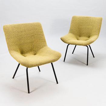 CARL GUSTAF HIORT AF ORNÄS, a pair of 'Leaf' easychairs, manufacturer Puunveisto Oy - Träsnideri Ab, mid-20th century.