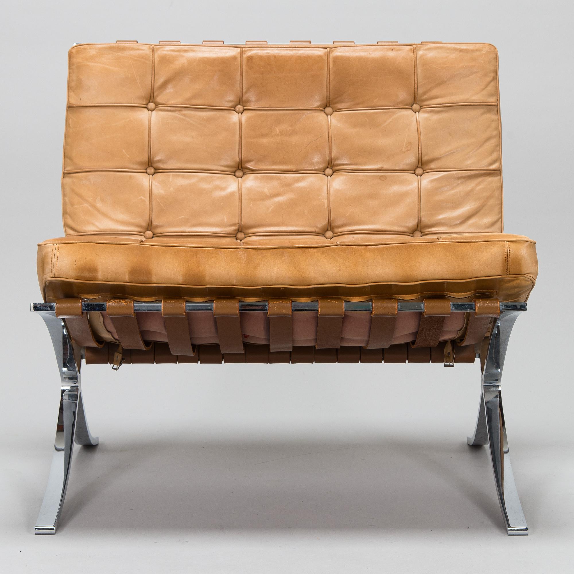A Ludwig Mies van der Rohe "Barcelona" chair.