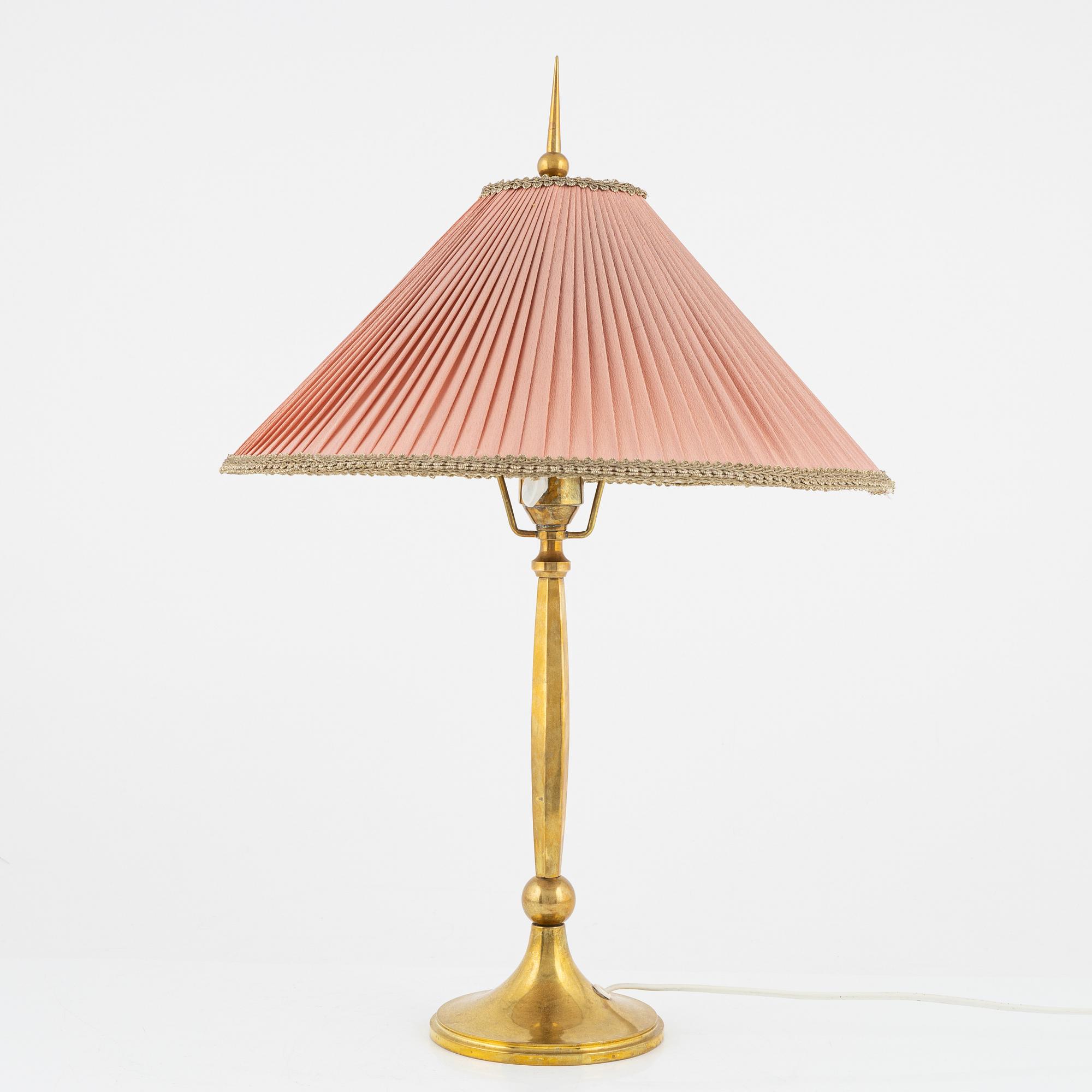 Harald Notini, a Swedish Grace '6851' brass table light, Arvid Böhlmarks Lampfabrik, Stockholm, 1920's.