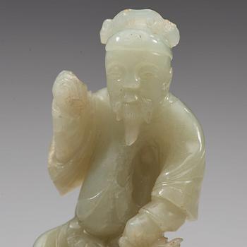 A nephrite sculpture of a man, Qing dynasty (1644-1912).