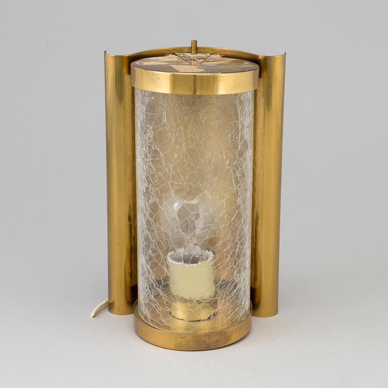 A WALL-LIGHT, brass and glass, probably 1970s.