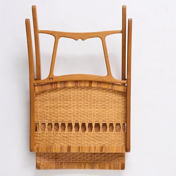 Hans J. Wegner, a foldable easy chair model 512, Johannes Hansen, Copenhagen, 1950s-60s.