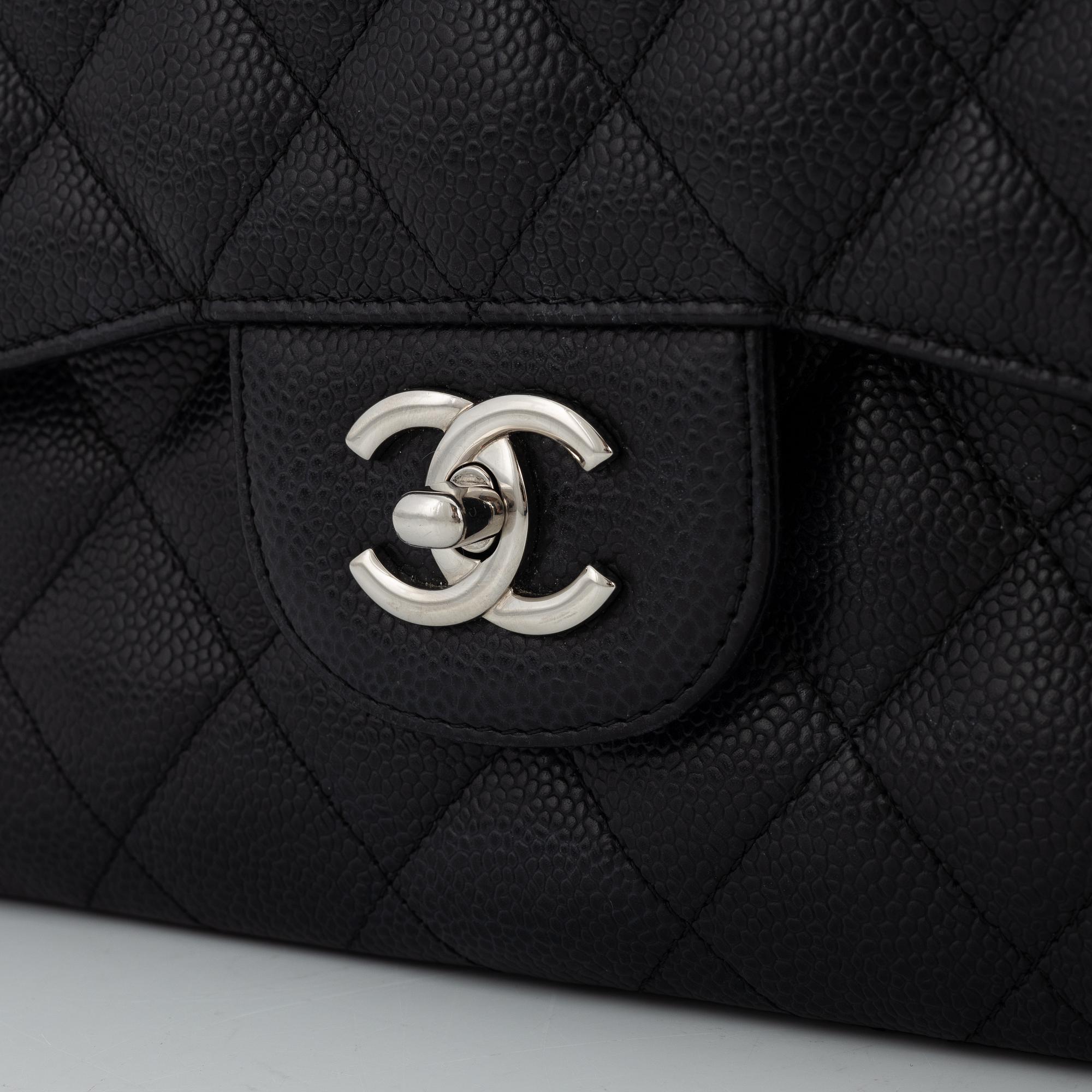 Chanel, a black caviar leather 'Double Flap Bag', 2013-14.