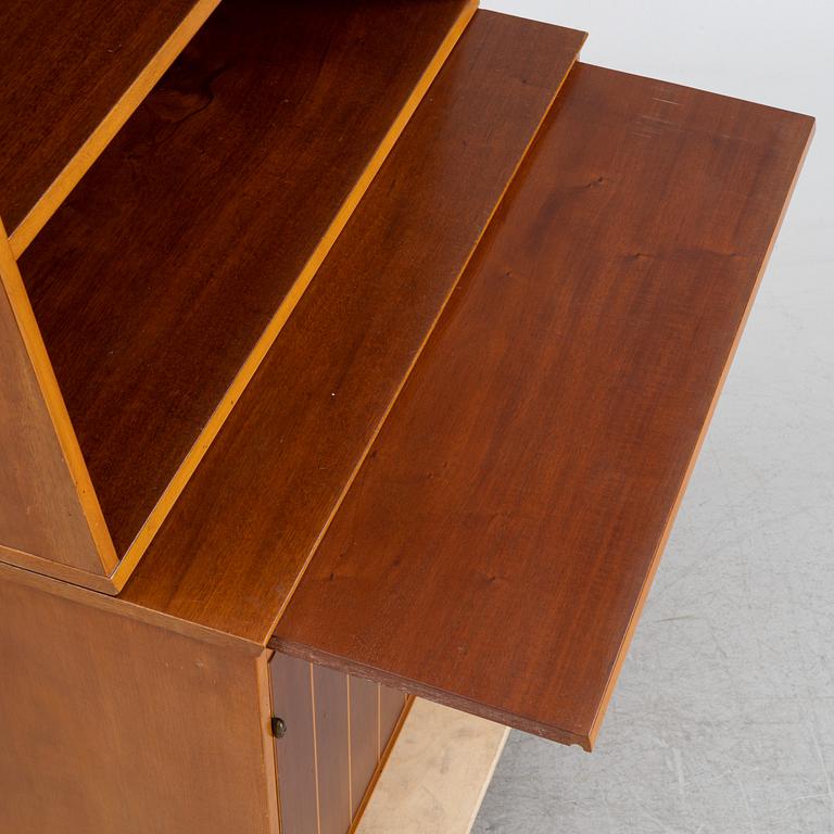 A book shelf with cabinet, 1960's.