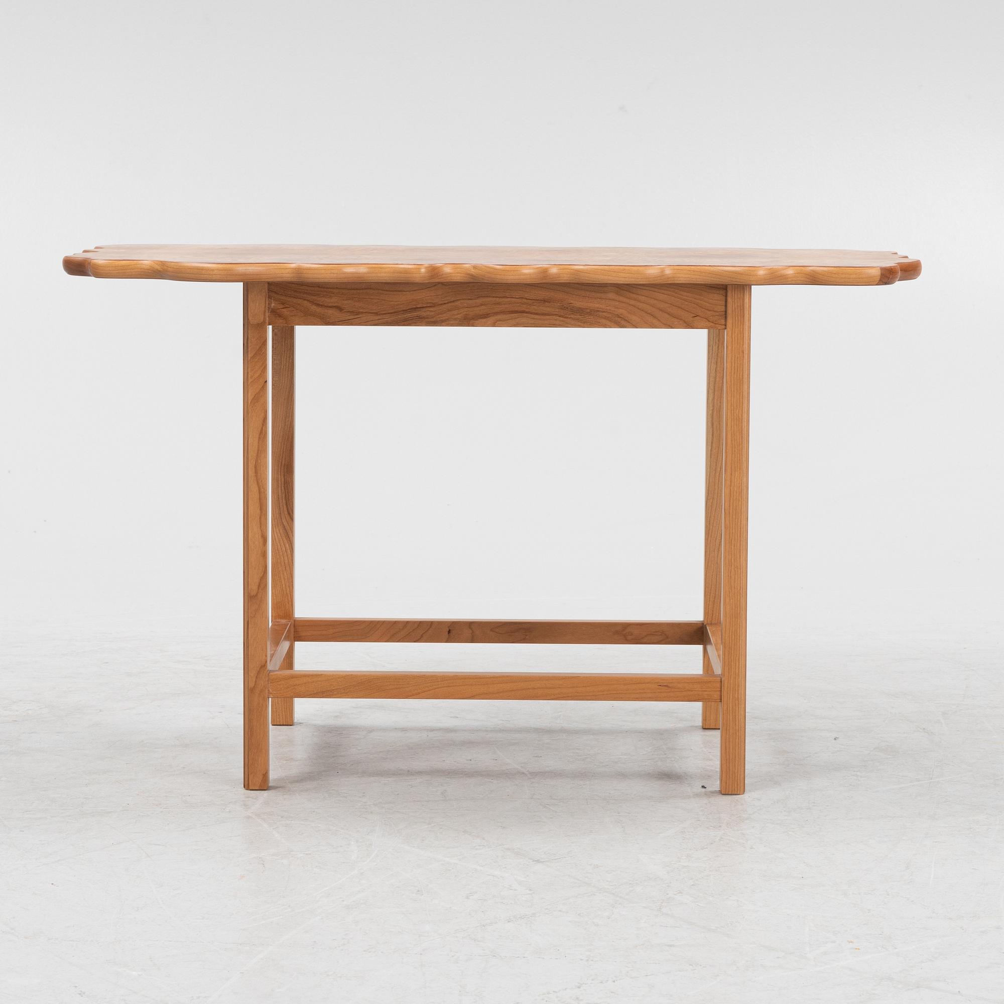 Josef Frank, an elm root top model 1058 coffee table from Firma Svenskt Tenn.