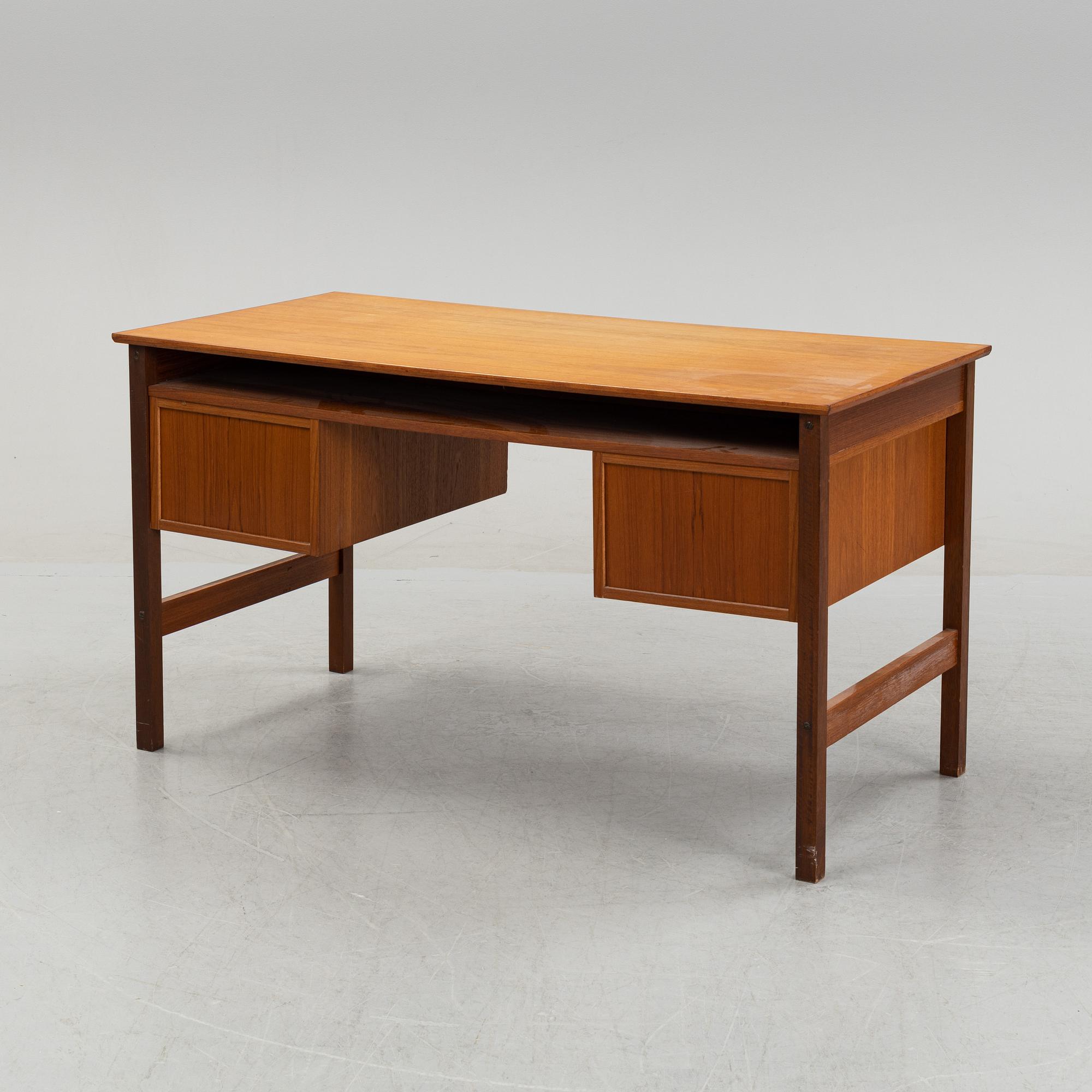 A 1960's teak writing desk.