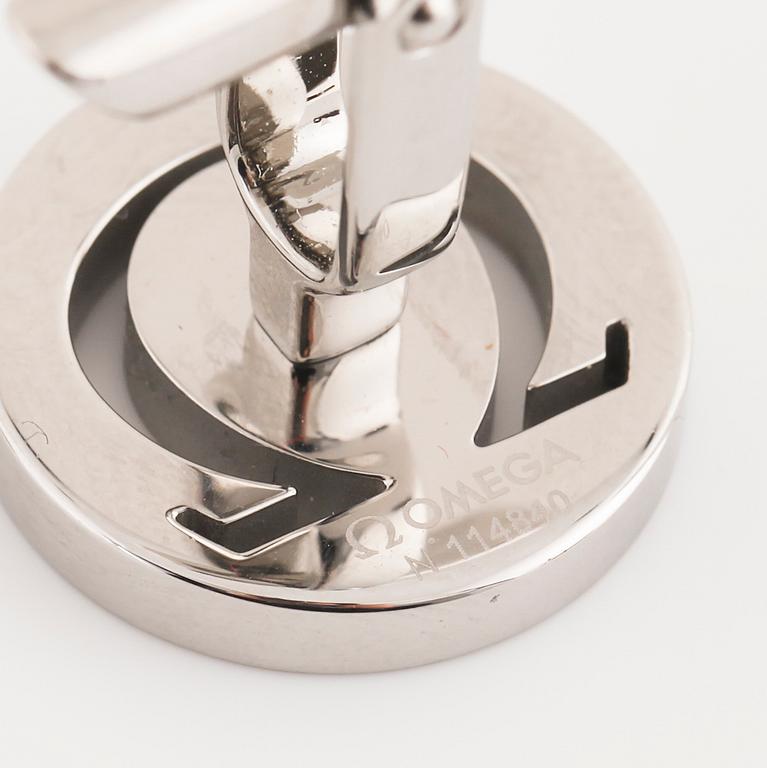 OMEGA, ett par manschettknappar.