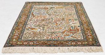 A Tabriz part silk rug, c. 145 x 100 cm.