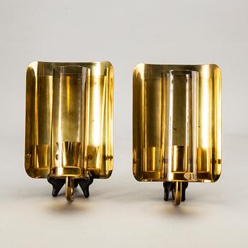 Hans-Agne Jakobsson, a pair of wall lamps.