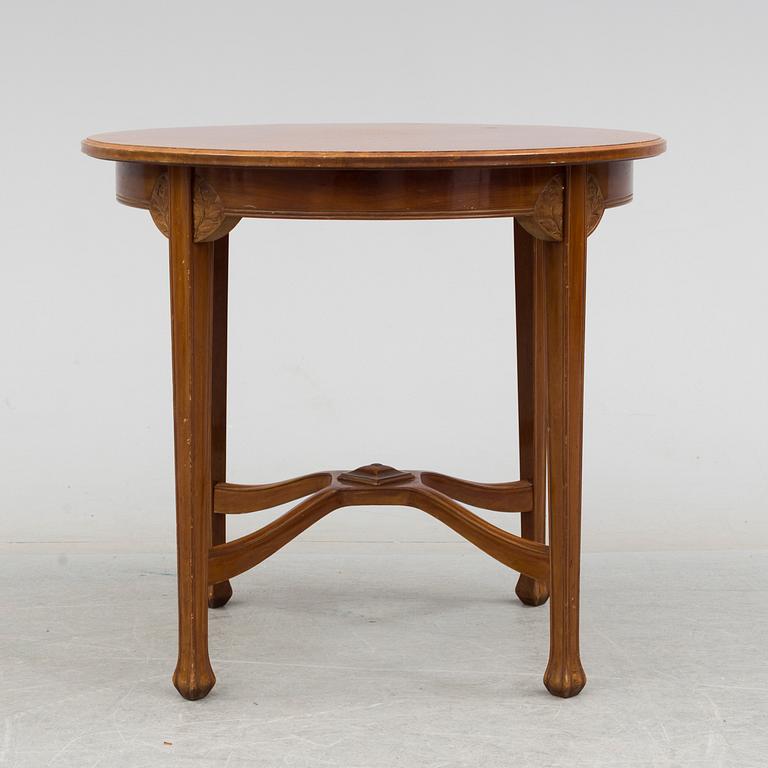 An early 20th century art nouveau table.